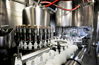 TPA cung cấp giải pháp máy đóng nắp chai tự động
